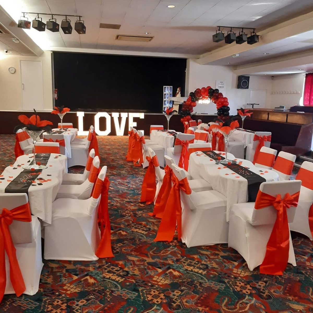 Concert Room arranged for a red and white celebration